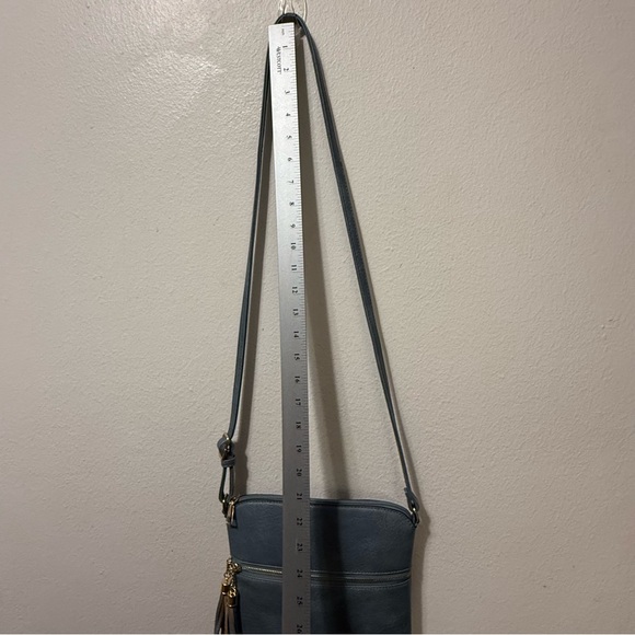Chic Blue Crossbody Bag with Tassel Accents - Picture 4 of 12